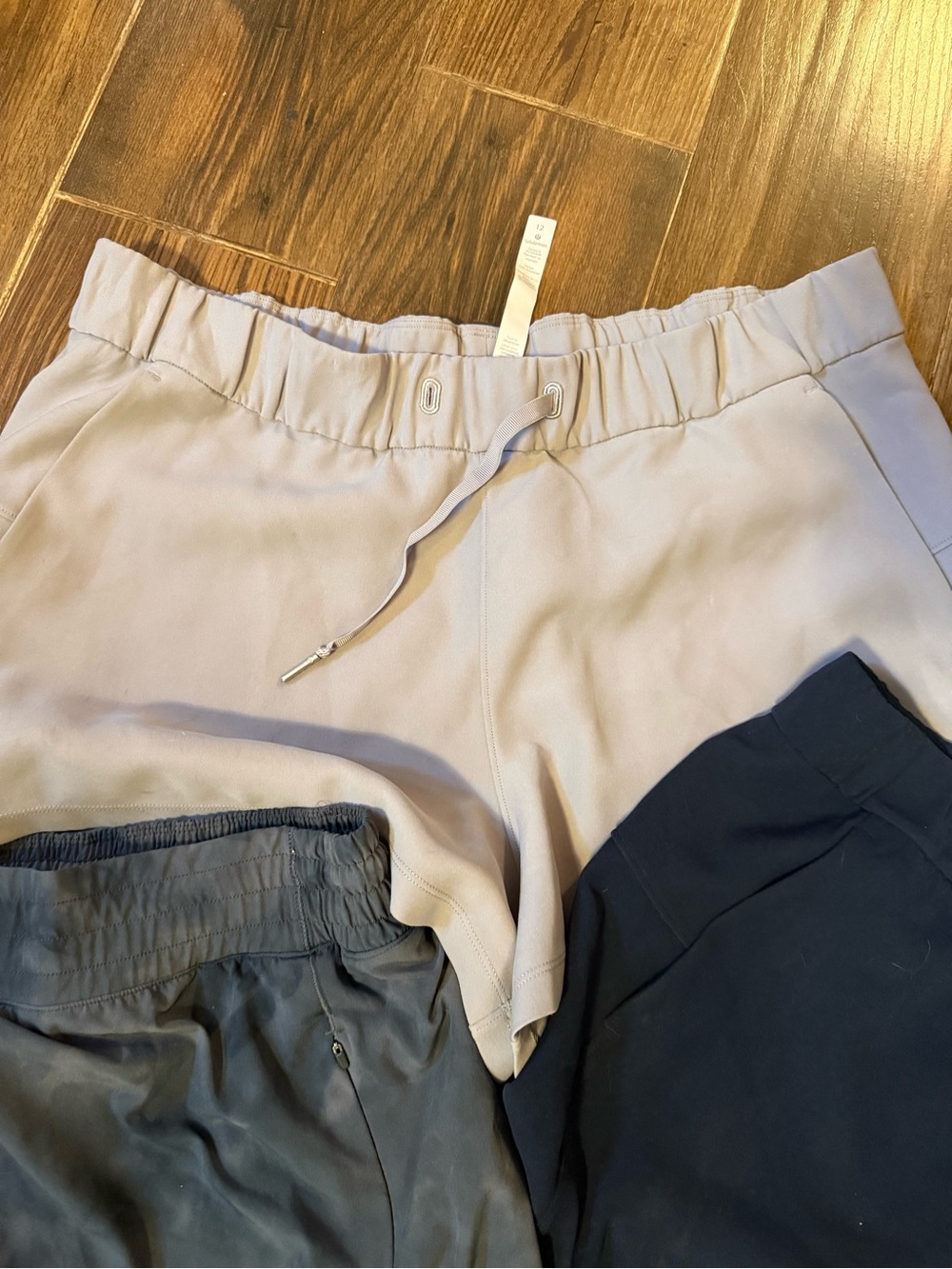 3 pair of lululemon shorts. 2 are size 12 and the gray are size 10. - Picture 4 of 7